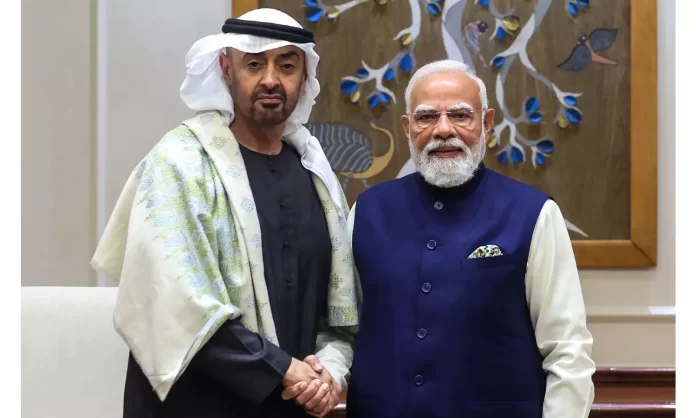 Indian PM Modi and UAE President Sheikh Mohammed bin Zayed Al Nahyan shaking hands in New Delhi.