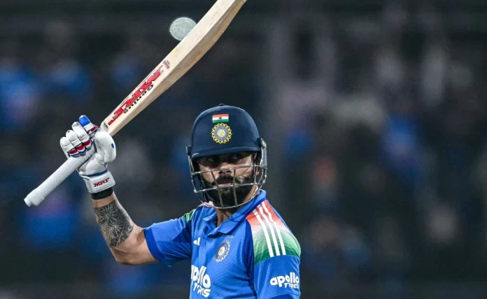 Virat Kohli celebrating his record-breaking 7th ODI century against New Zealand in Indore.