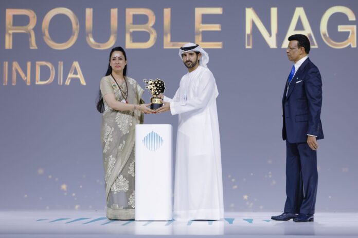 Indian educator Rouble Nagi receiving the Global Teacher Prize 2026 from Dubai Crown Prince at the World Government Summit.